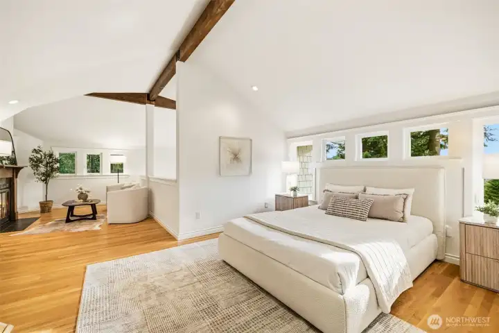 The luxurious primary retreat features a cozy fireplace lounge, spa-inspired ensuite bath