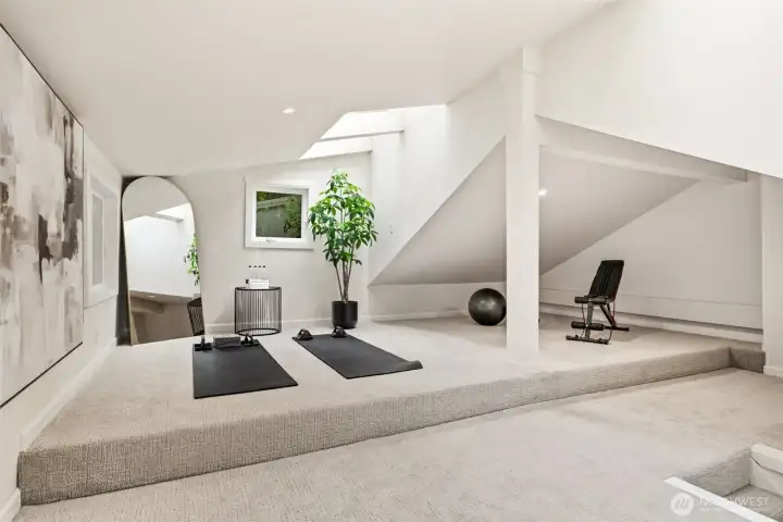 An additional oversized bonus room above the garage provides endless possibilities for a home business, creative studio, gym, or music room.