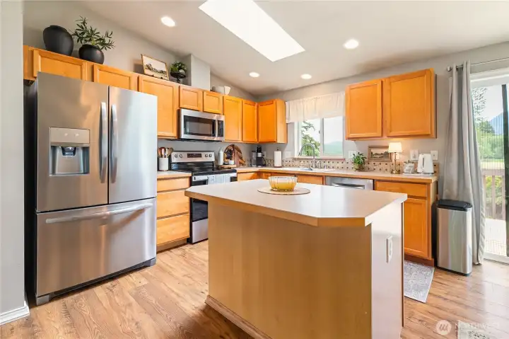 Skylight and stainless steel appliances in the kitchen