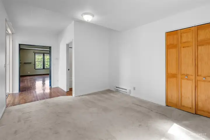 Family room with additional storage closet Family room with additional storage closet