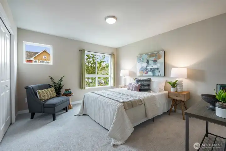 Large 2nd bedroom upstairs with beautiful east morning light. Large 2nd bedroom upstairs with beautiful east morning light.