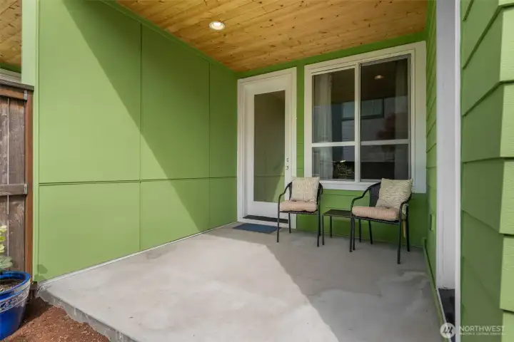The lower level covered patio with lighting overhead. The lower level covered patio with lighting overhead.