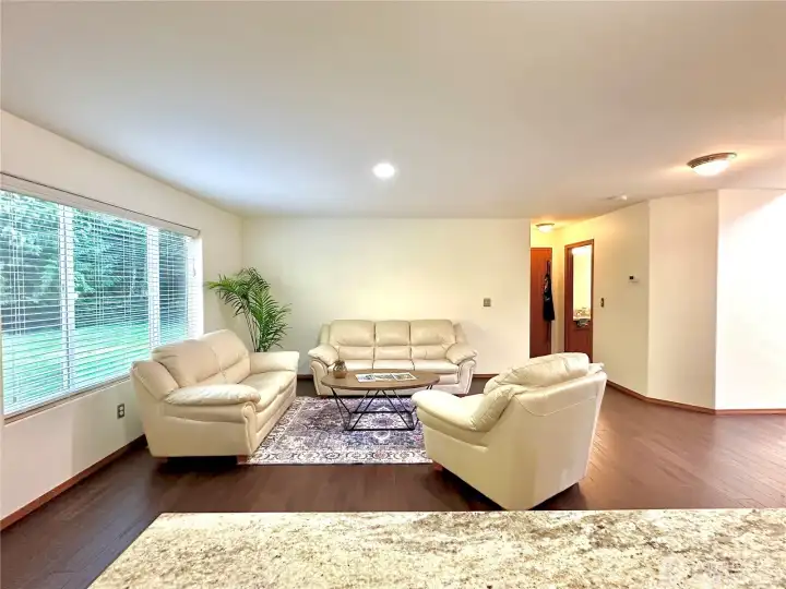 Open living room with views of the peaceful outdoor space.
