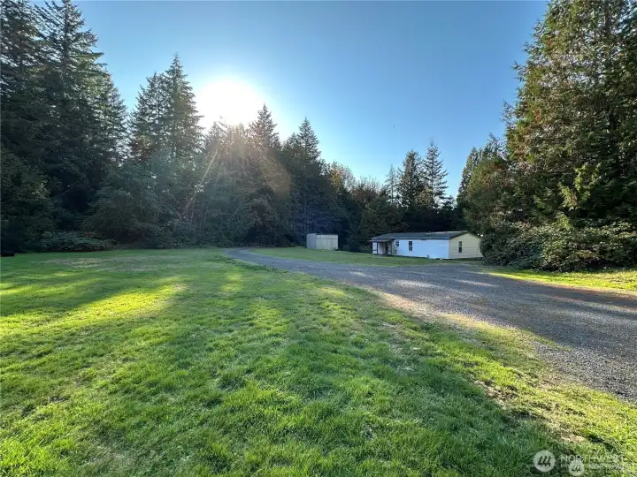 Yard to remodeled ADU with new roof.