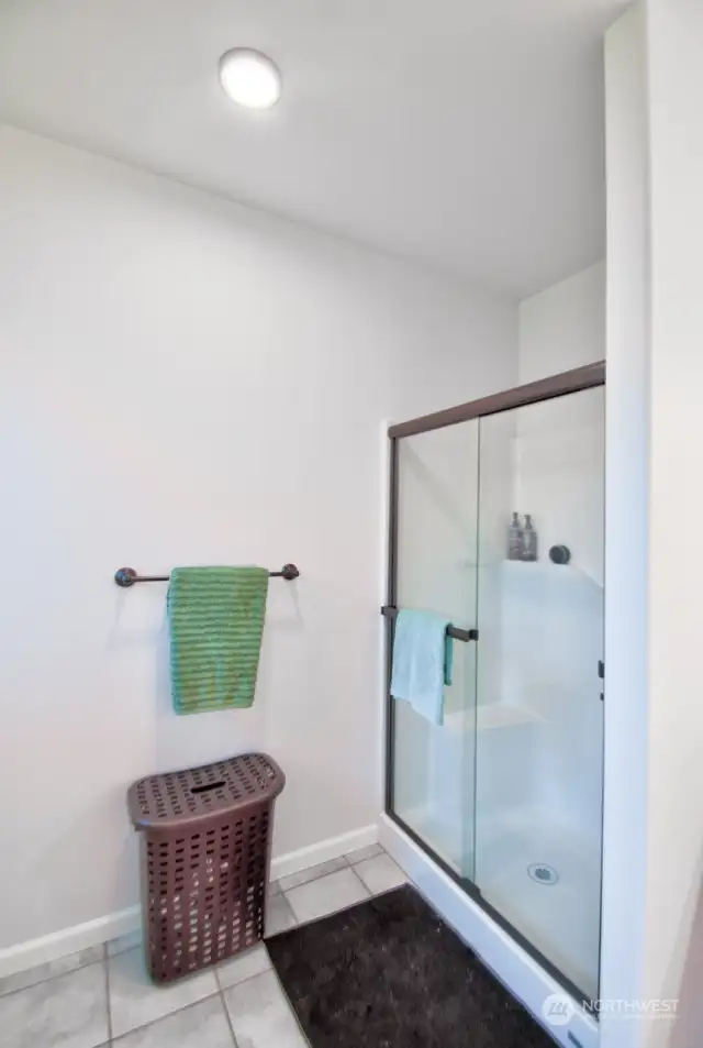 Walk in shower in primary bathroom.