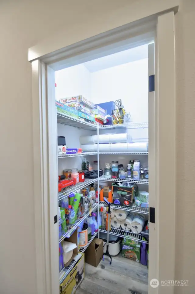 Additional storage closet in primary hallway.