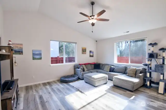 Large living room with vaulted ceilings.