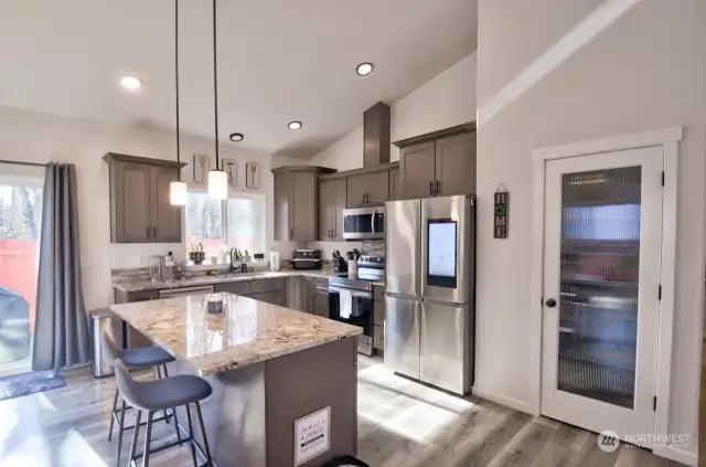 Island for informal eating space in kitchen.