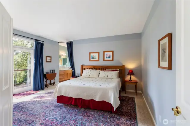 Back inside the home, the enormous main-floor master suite is light and bright.