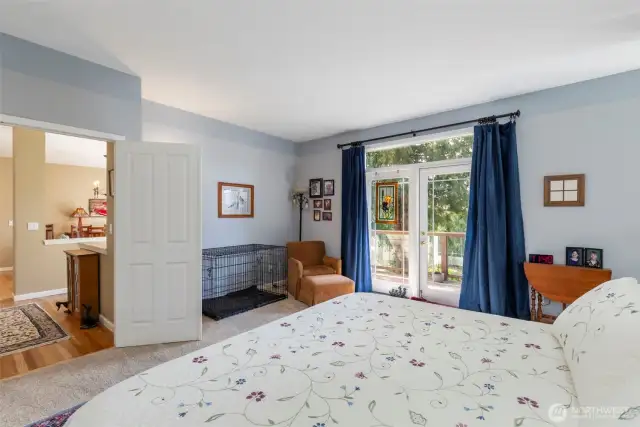 Another set of pretty french doors provide access outside to your own private deck for that morning or evening beverage!