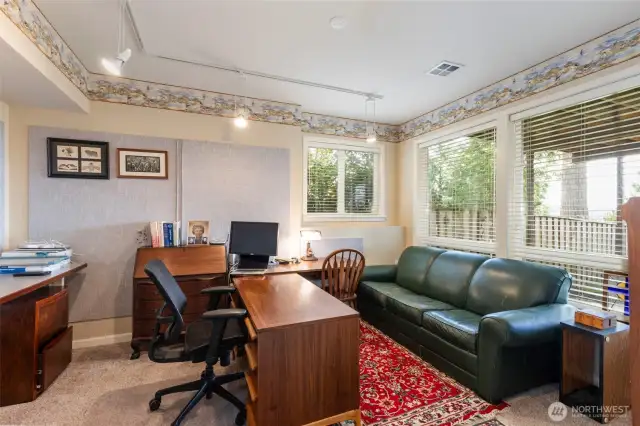 This fabulous finished room could be a second office, hobby room, or even a guest space.