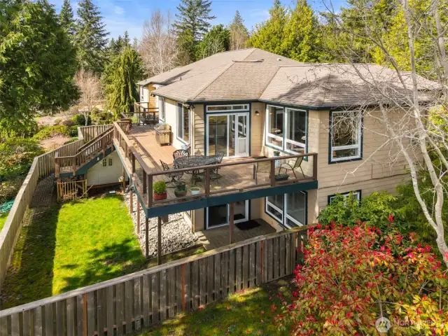 This wonderful home design offers so many spaces to enjoy all the peninsula provides!