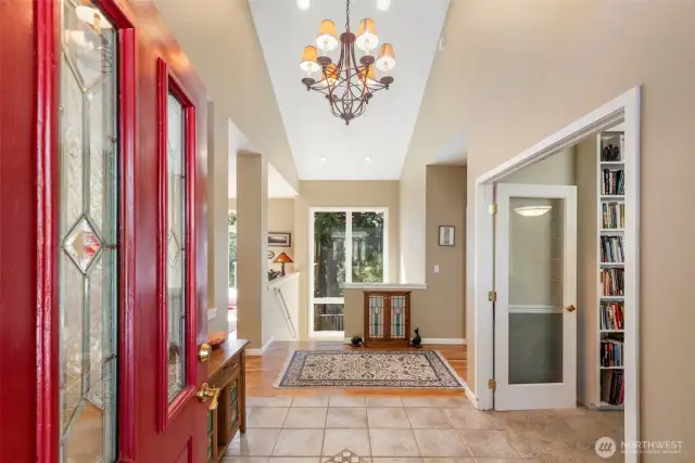 A soaring entryway welcomes you inside. A wonderful office/library is accessible to the right.