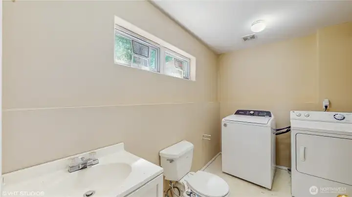 Lower Level Powder Room & Utility Room