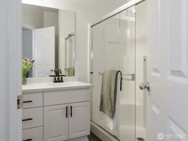Quartz counter, walk-in shower...
