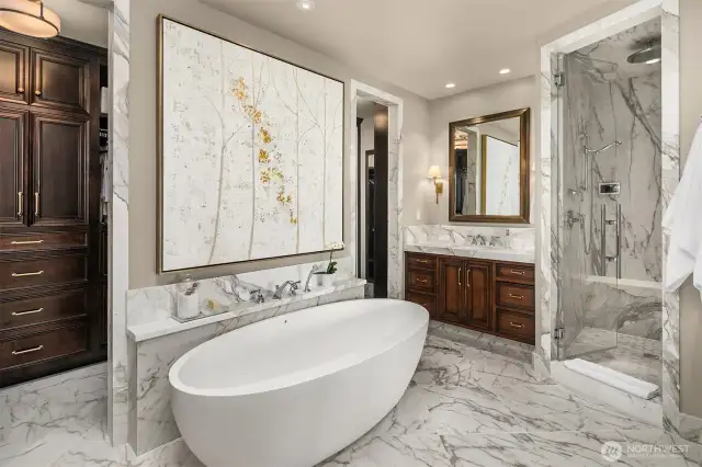 The epitome of lavish luxury with no expense spared. This primary 5 pc spa bath is replete with a large walk in steam shower, jetted MTI soaking tub and 2 dual vanities. Perfection realized!