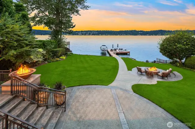 A  multitude of entertainment decks and custom fire features throughout the property deliver drama and warmth!