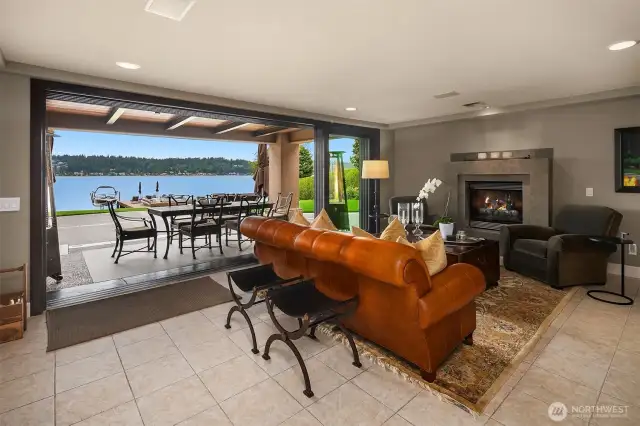The ground floor of this fine residence totally rocks! Nano-doors provide for the ultimate in al fresco living!