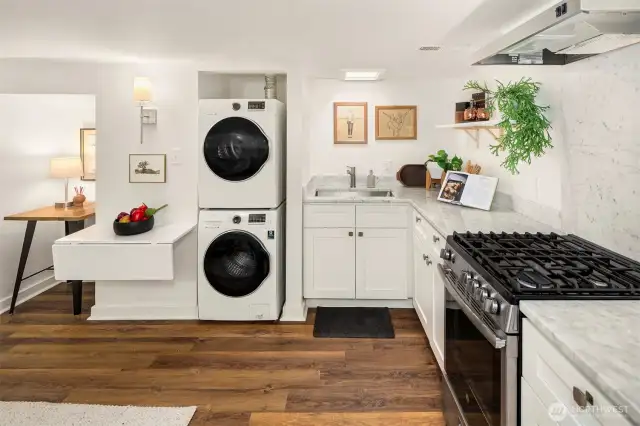 Full size laundry machines and a gorgeous kitchen here.
