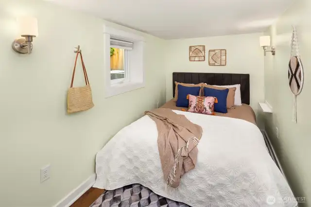 The bedroom is very sweet and cozy.