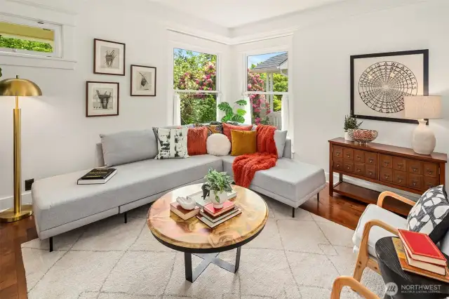 Another view of the beautiful living room which overlooks the beautiful Thackeray trees.