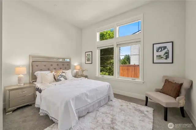 Main-floor bedroom/den with adjacent full bath