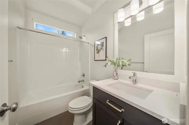 The full bath next to the main floor bedroom/den