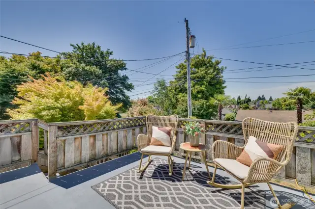 Deck with stairs leading to the back yard.