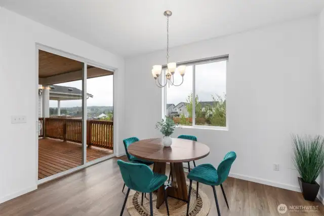Dining area: Slider to deck with a view