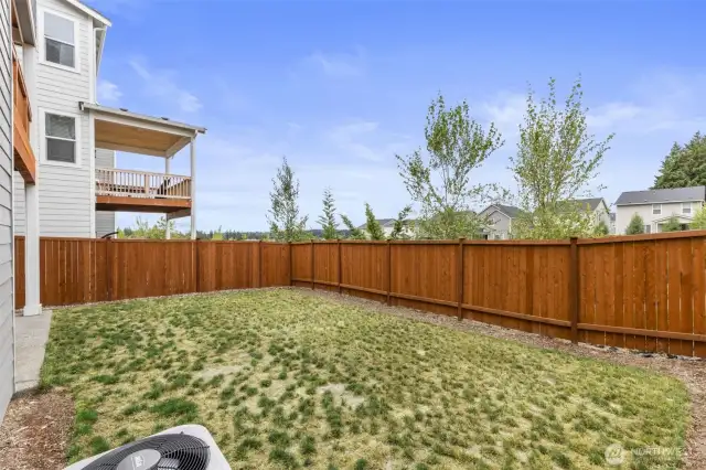 Fully fenced yard, plus home has air conditioning!