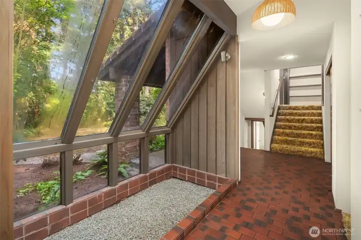 Front hallway with atrium and main floor entry