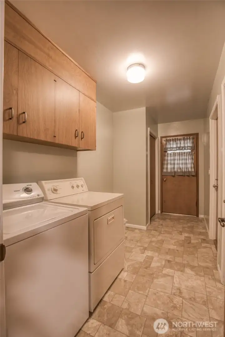 Laundry with cabinets