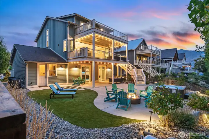 Exterior twilight view of outdoor living area.
