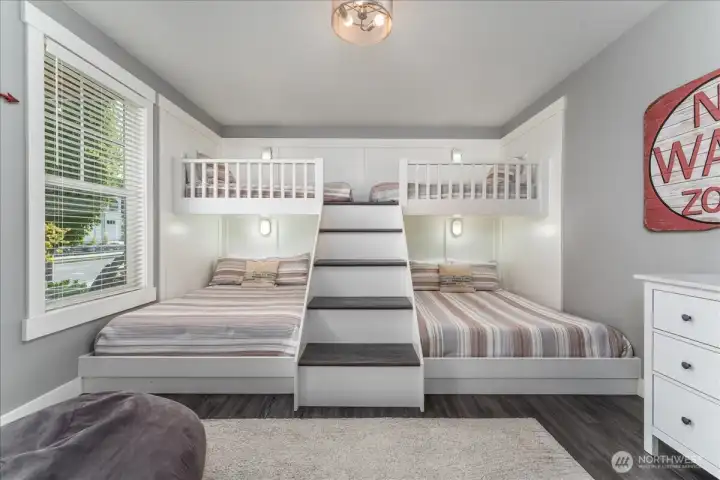 Main floor Bunk Room with twin over queen sized beds.