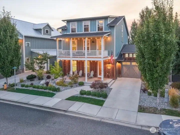Exterior twilight view of home facing west.