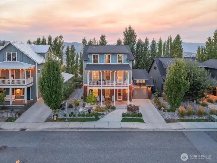 Exterior twilight view of home facing west.
