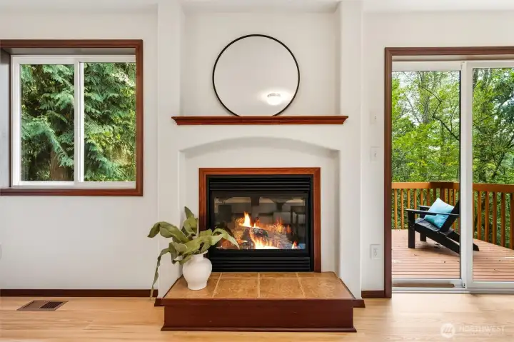 Cozy up with this gas fireplace and enjoy the green canvas as the windows surround you with territorial views.