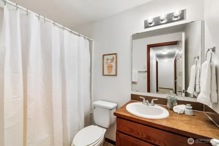 Full guest bathroom upstairs.