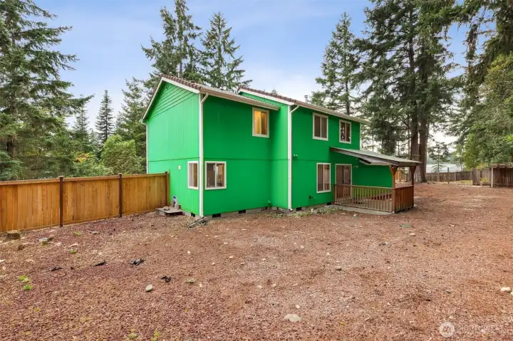 Backyard & Exterior:  Enjoy a spacious, fully fenced backyard surrounded by towering evergreens for exceptional privacy and a true Pacific Northwest feel. The level lot offers plenty of room for gardening, play, or future customization. A covered back deck provides a sheltered outdoor space for year-round enjoyment, with ample additional yard space extending along both sides of the home.