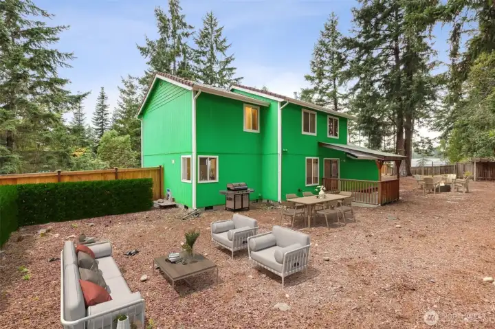 Backyard & Exterior:  Enjoy a spacious, fully fenced backyard surrounded by towering evergreens for exceptional privacy and a true Pacific Northwest feel. The level lot offers plenty of room for gardening, play, or future customization. A covered back deck provides a sheltered outdoor space for year-round enjoyment, with ample additional yard space extending along both sides of the home. Virtually staged.