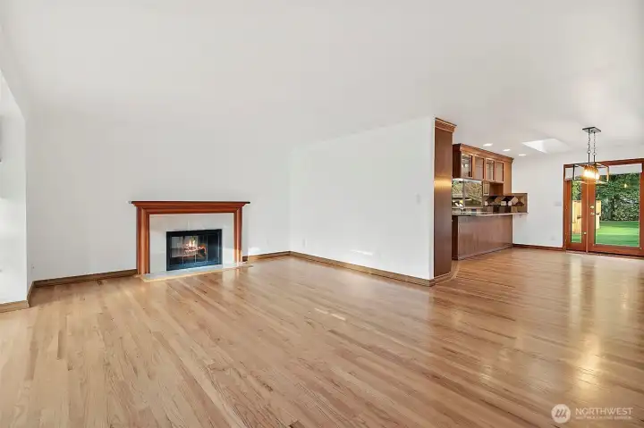 Family room with see through fireplace into living room.