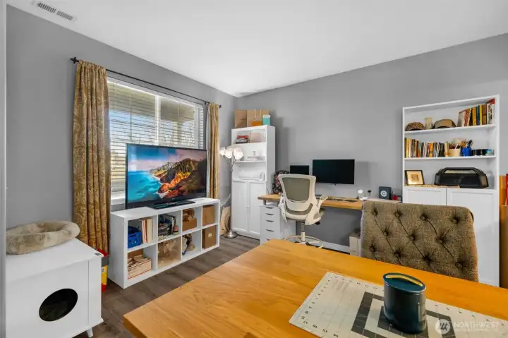 Formal living room is currently used as office