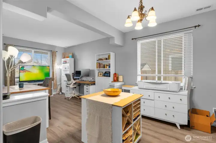 Formal dining room is currently used as craft area