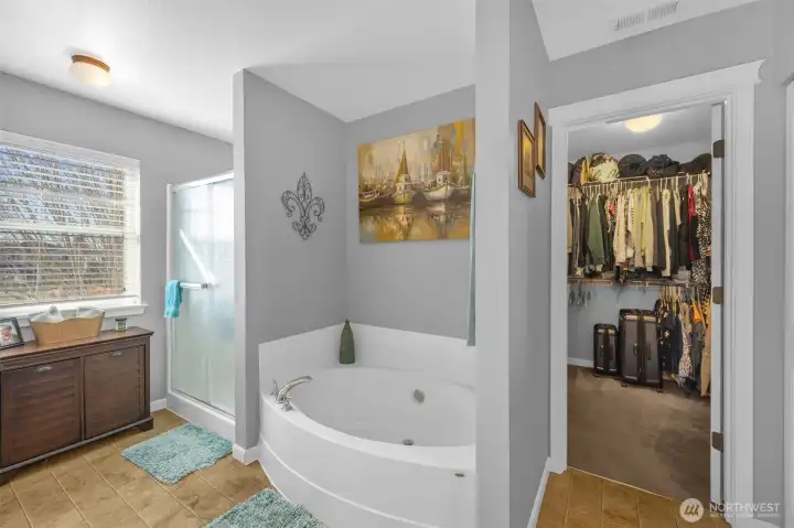 Primary bathroom with soaking tub and separate shower