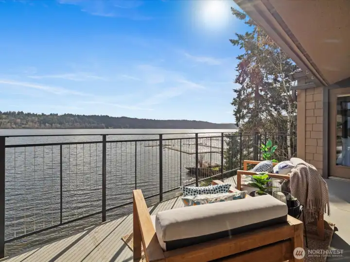 Lake Sammamish waterfront deck with direct water views and outdoor seating area overlooking the shoreline