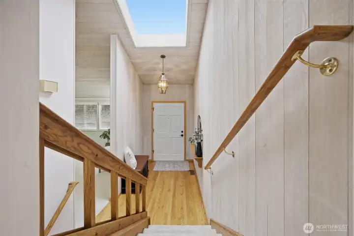 Welcoming entrance includes a skylight.