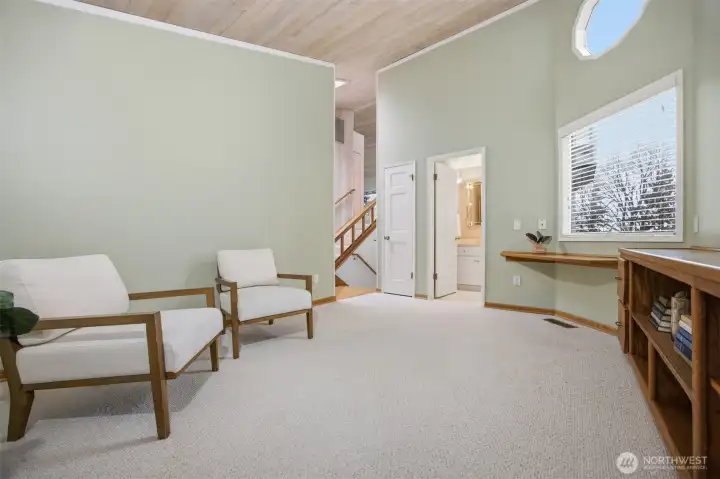 Den off the entrance offers a flex space for working/TV/gym/your choice.