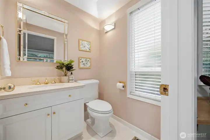 Half bath off of den.