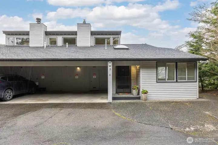 This unit comes with two covered spaces.