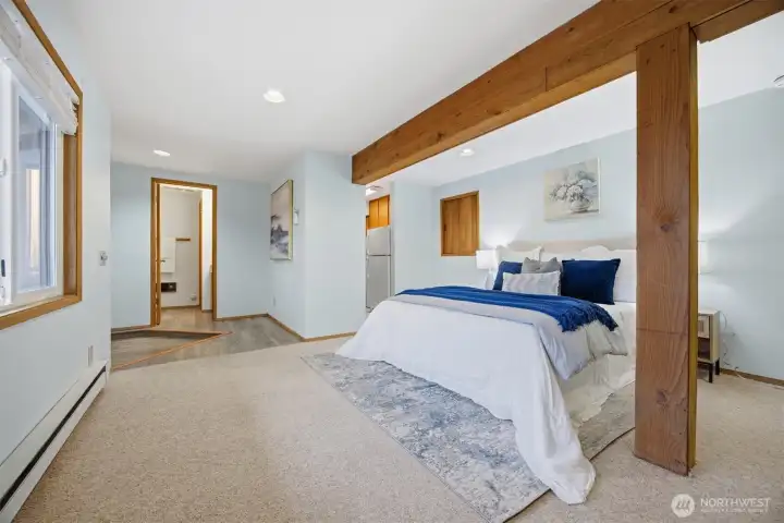 3/4 Bath and little kitchenette. Walk-in closet not visible.